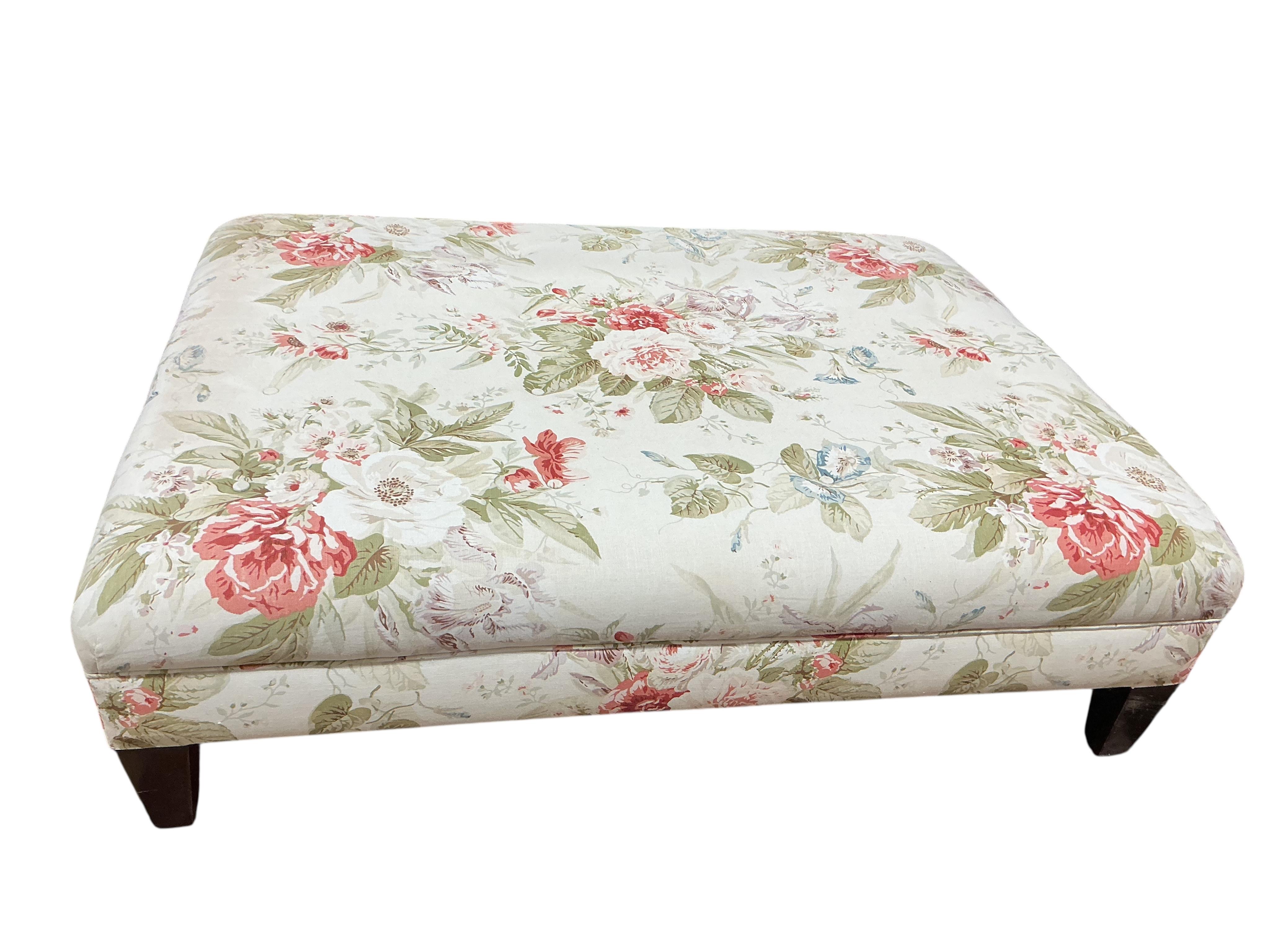 A large rectangular floral buttoned upholstered ottoman footstool, width 118cm, depth 88cm, height 35cm